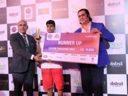 Rohit Rajpal of Indian Olympic Association giving award to the winner of boxing competition held under the banner of IABF in Delhi